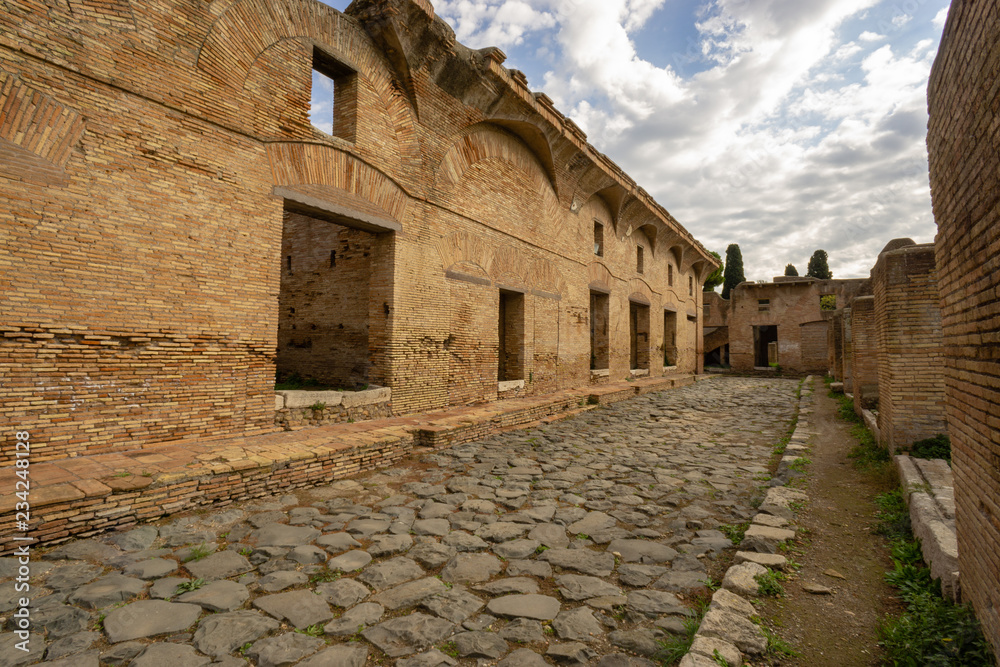 Ostia antica in Rome, Italy.Ostia antica in Rome, Italy. Archaeological Roman empire street view with original ancient Roman buildings