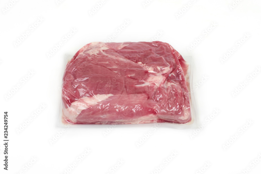 Fresh pork meat in vacuum packed, isolated on a white background
