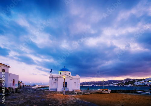 Pictiresque sunset on Mykonos island photo