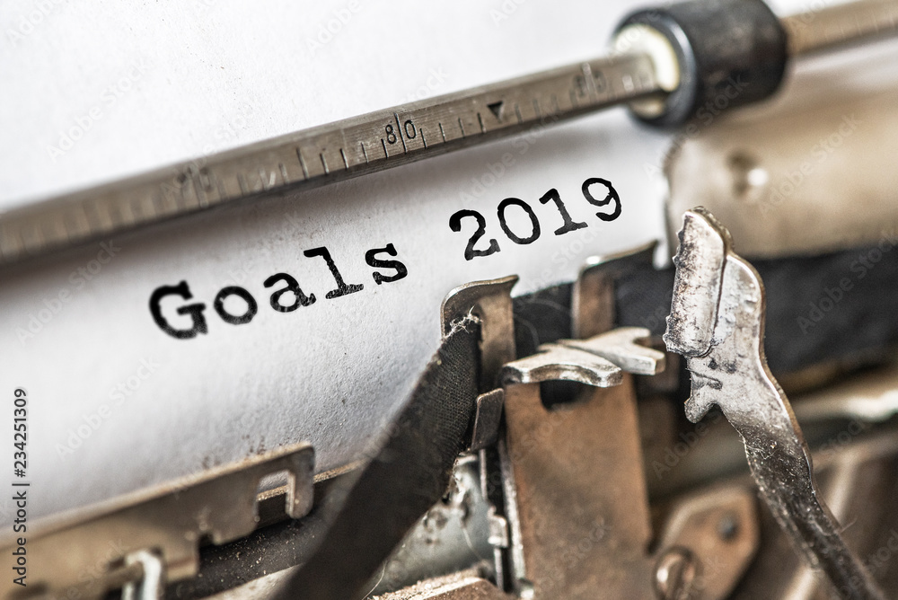 Goals 2019 typed words on a vintage typewriter. Close up