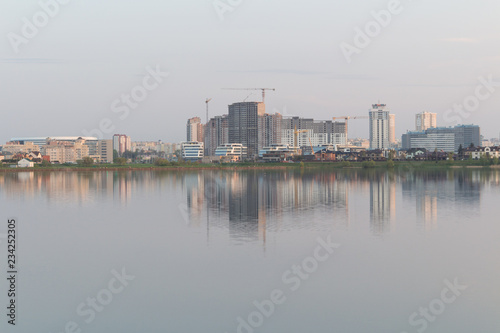 The reflection of the city in the lake