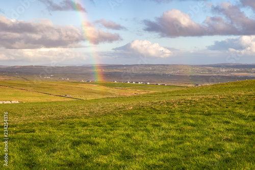 Photography Double rainbow over meadow in Ireland