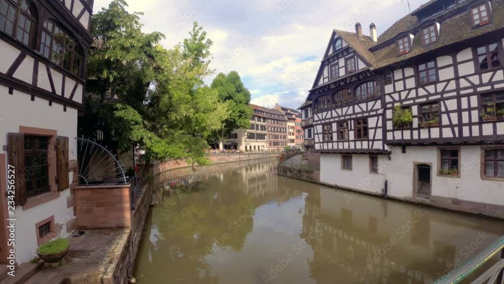 Walk with a video camera along the embankment of the Ile River in the French city of Strasbourg. Slow motion Walk with a video camera along the embankment of the Ile River in the French city of Strasbourg. Slow motion
