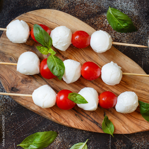 Italian cheese mozzarella with tomatoes  basil and olive oil
