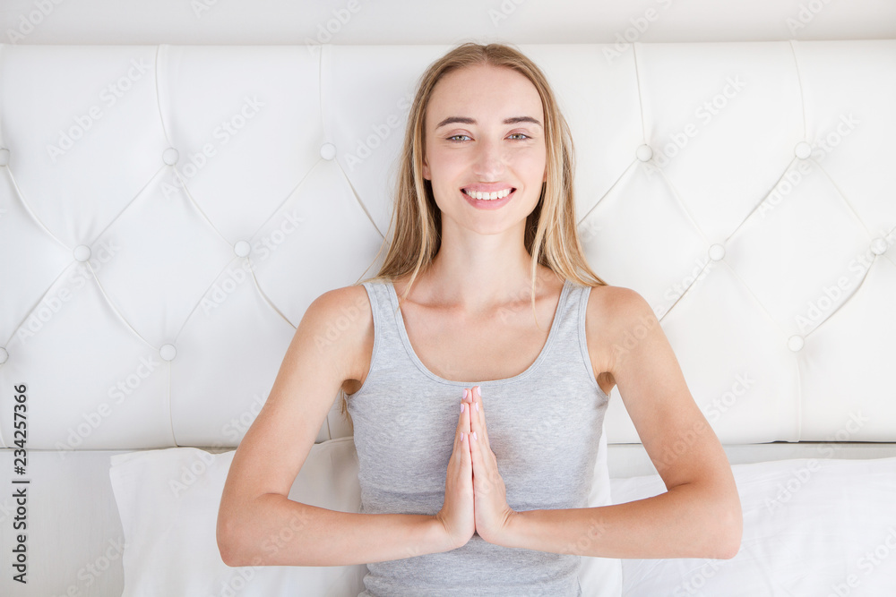smile woman with namaste gesture in bedroom, mock up smile woman with namaste gesture in bedroom, mock up