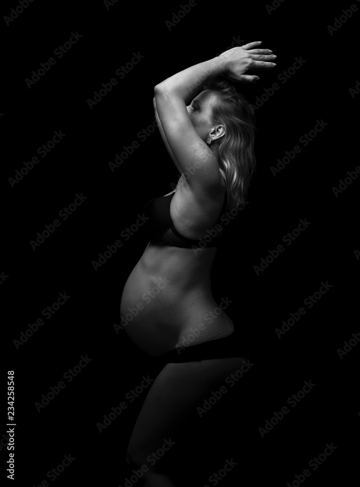 Obraz premium Blonde pregnant woman