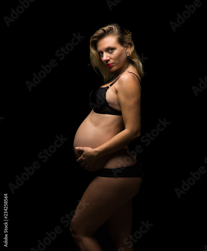 Blonde pregnant woman © luismolinero