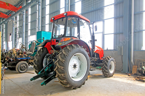 large tractor in storage workshop