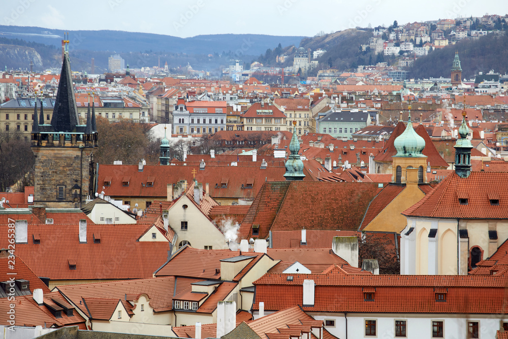 Obraz premium Houses with traditional red roofs in Prague, Czech Republic. View from above