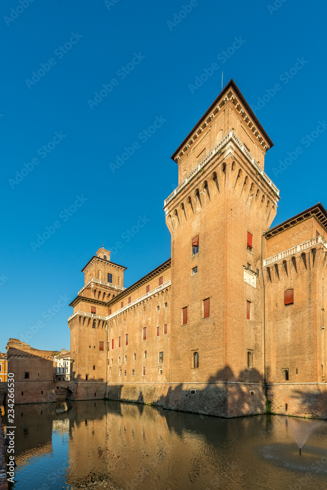 View at the Estense Castle with moat in Ferrara - Italy