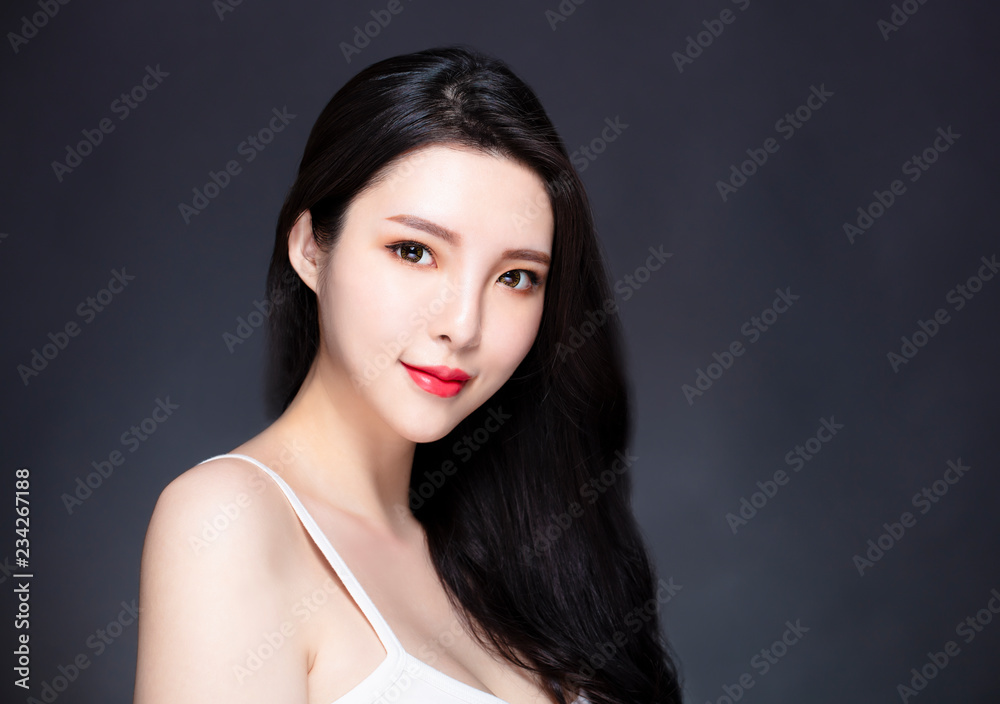 Naklejka premium young asian beauty with makeup and long hair