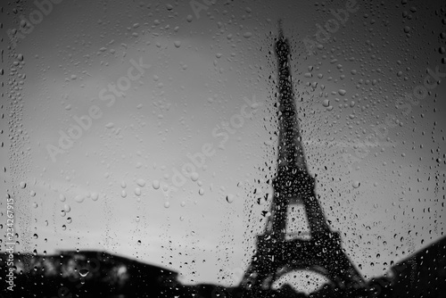 Photography Paris Eiffel Tower through window at rainy weather