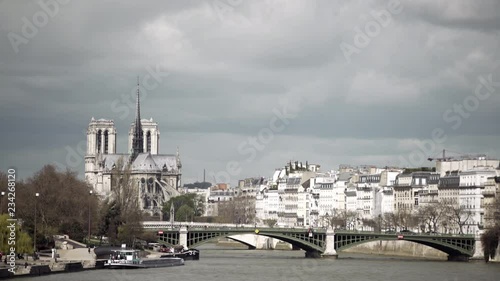 Notre Dame and the Seine establishing shot