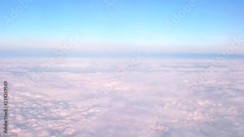 Blue Sky and passing clouds from above