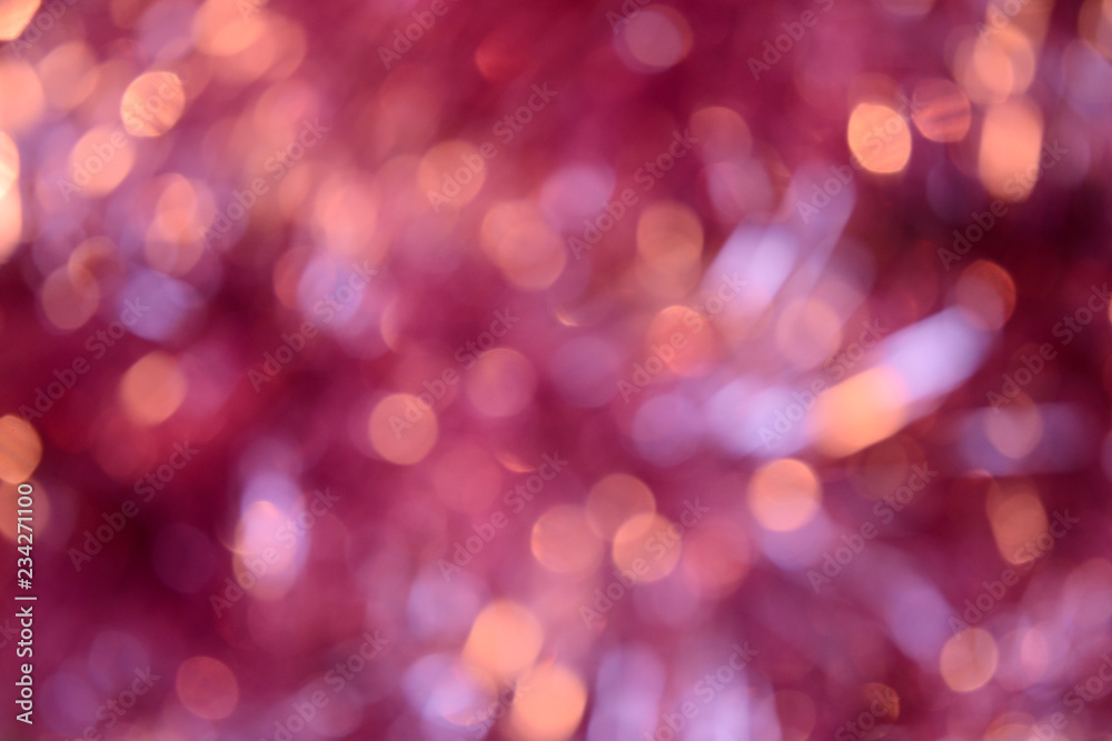 Bokeh photo. Holiday background. Christmas lights. Defocused sparkles. New Year backdrop. Festive wallpaper. Blinks. Carnival. Bokeh retro style photo. Pink.