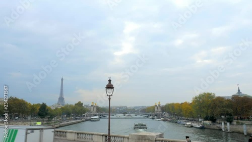 establishing shot of typical Paris overlooking the eiffel tower and pont d’invalides and grand palais