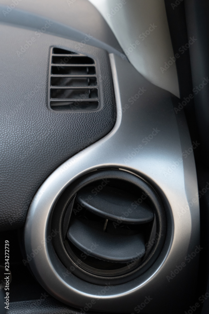 Air conditioning holes in car. Air ventilation inside driver place. Air conditioning holes in car. Air ventilation inside driver place.