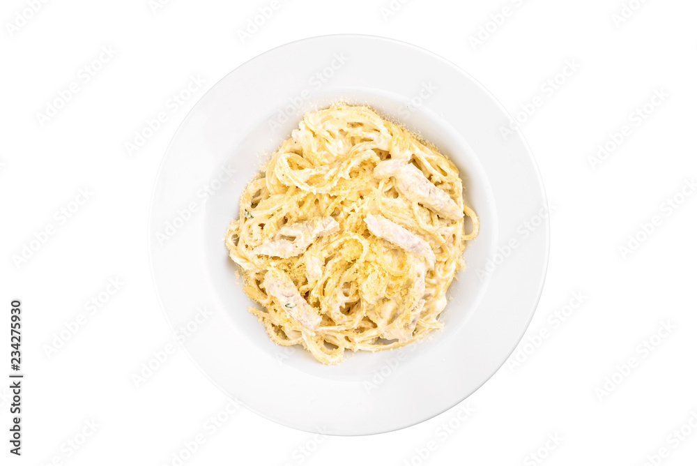 Spaghetti with chicken in dairy sauce in a white plate isolated on white background. top view. flat lay Spaghetti with chicken in dairy sauce in a white plate isolated on white background. top view. flat lay