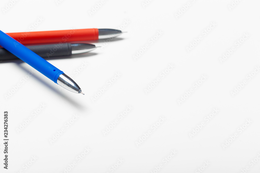 different colors pens isolated on the white background different colors pens isolated on the white background