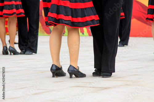 red stripe dress and black shoes