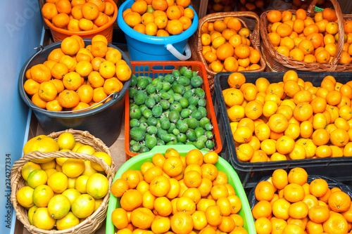 juicy ripe fruit  tangerines  lemons and feijoa