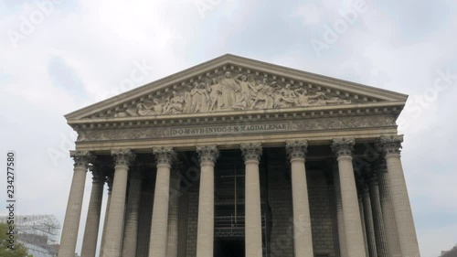 Tilting down on the Madeleine church in Paris. 