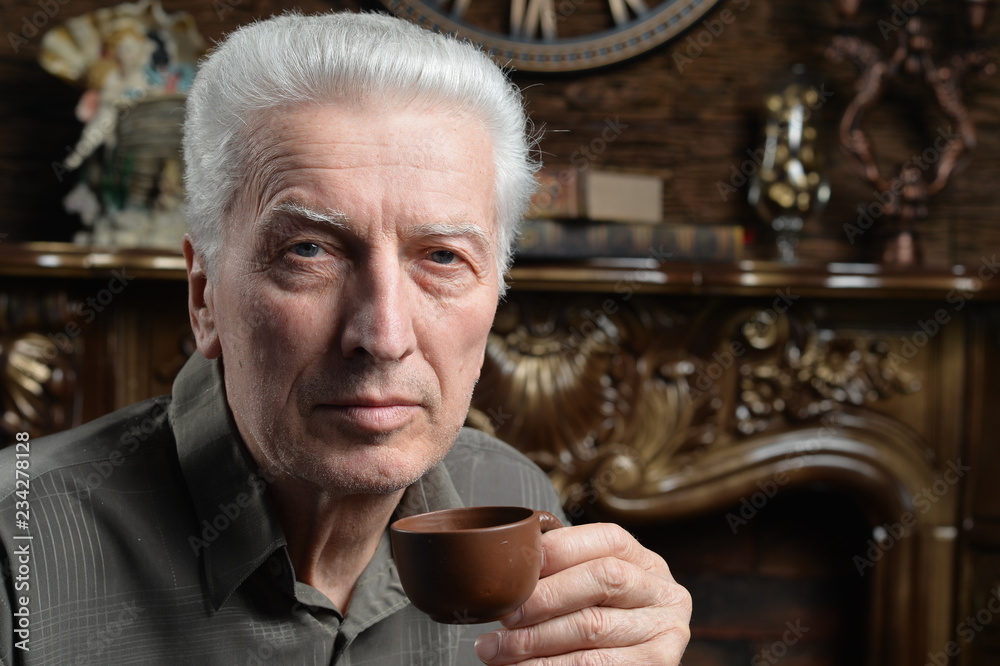Portrait of beautiful senior man drinking tea Portrait of beautiful senior man drinking tea