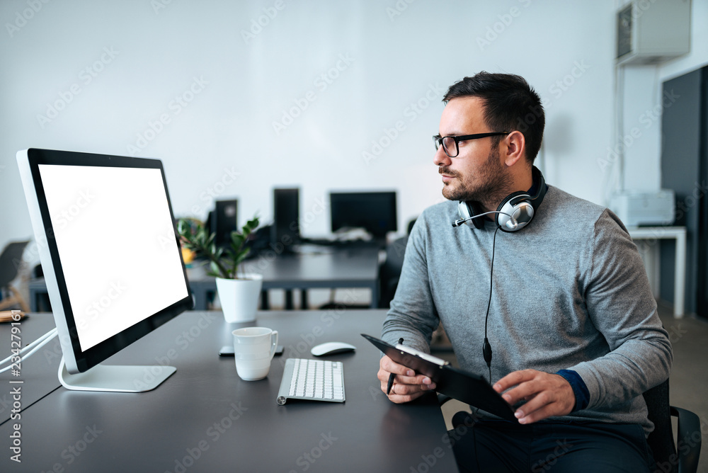 Sales marketing manager analyzing data report checking project results on pc screen at workplace. Sales marketing manager analyzing data report checking project results on pc screen at workplace.