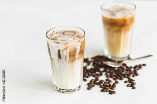 Delicious drink concept - Iced coffee in a glass with ice.