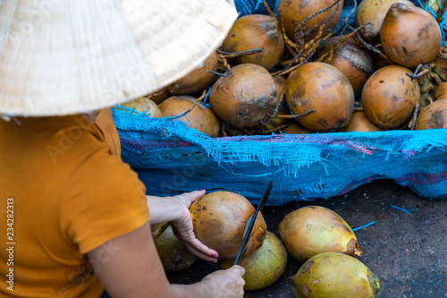 Sellers on the local market in Vietnam. Traditional food market in Hue, Vientam. photo