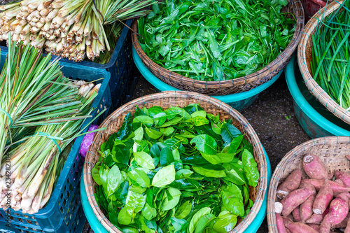 Sellers on the local market in Vietnam. Traditional food market in Hue, Vientam. photo