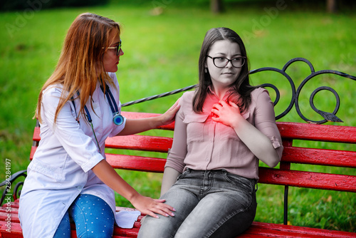 Healed in the chest. caring doctor or nurse taking young patient photo