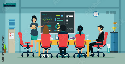 Employees are describing a business charging plan on a blackboard.
