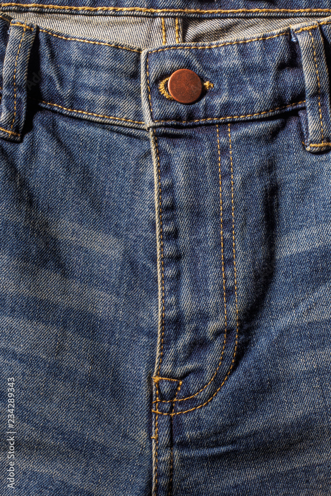 Blue jeans texture with button and zip details Blue jeans texture with button and zip details