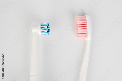 Dental concept. Toothbrush and electric toothbrush isolated.Care health, hygiene healthy.
