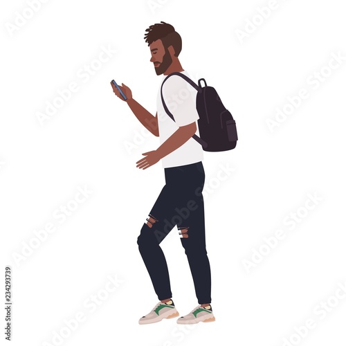 Bearded African American man wearing casual clothing and backpack using smart...