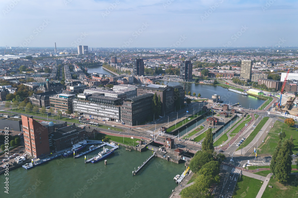 view from above on canals and cityscape of Rotterdam