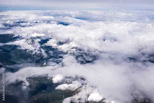 Aerial view of italian Alps with clouds