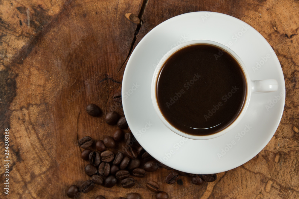 Coffee in a wood table Coffee in a wood table