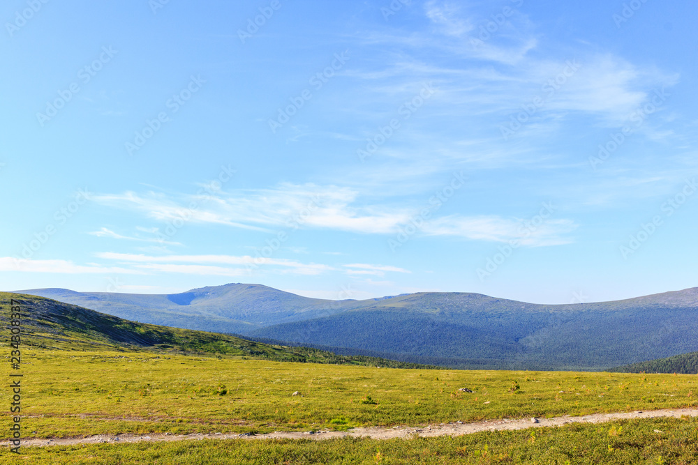 Footpath in the mountains. Beautiful panoramic view of the mountains. Northern Ural. Travels.