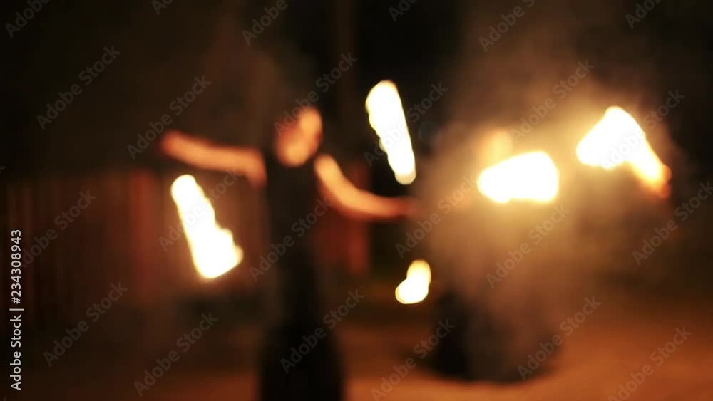 blurred background fire show, fakirs perform. blurred background fire show, fakirs perform.