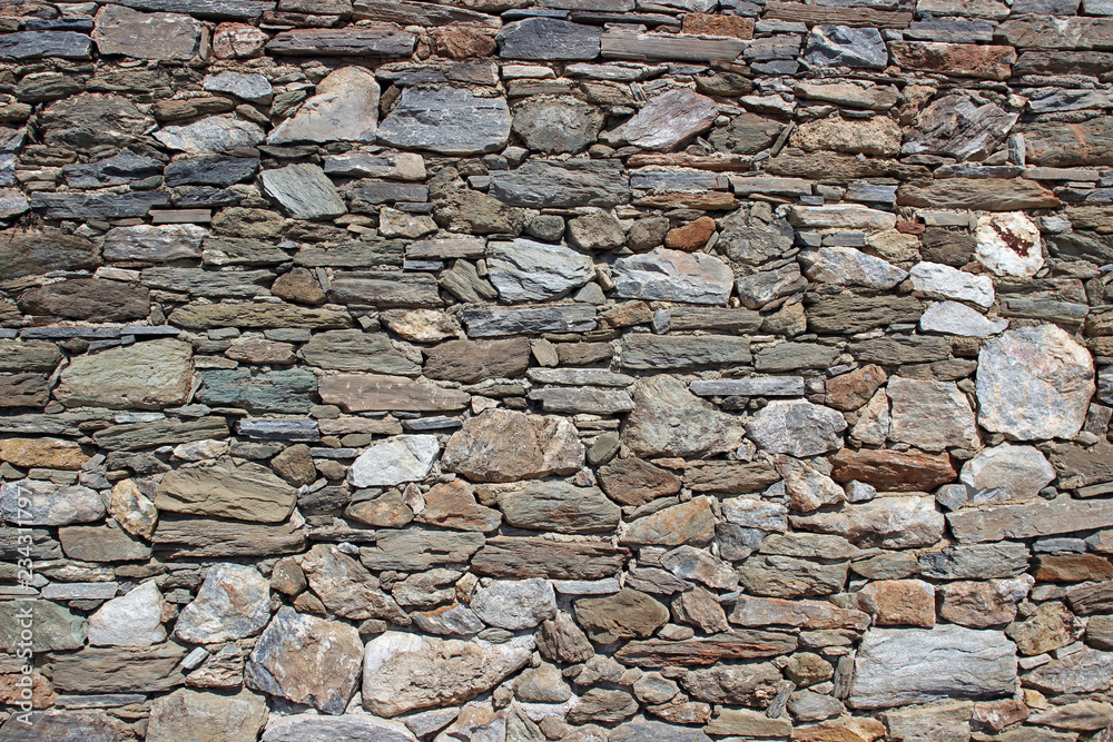 Fototapeta premium Stone wall surface texture close up detail