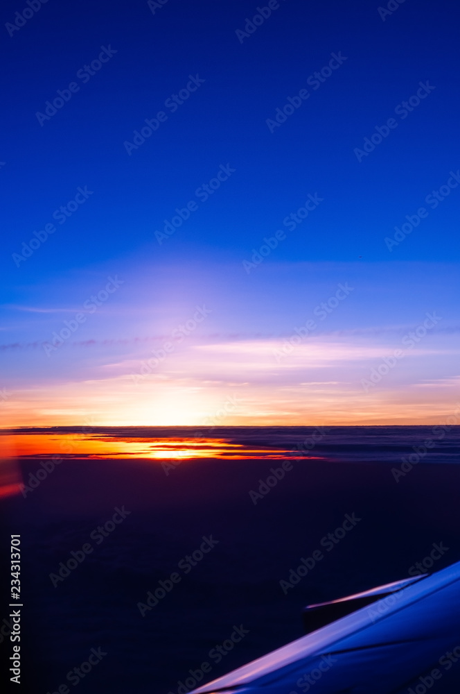 Beautiful twilight sky looking from airplane,