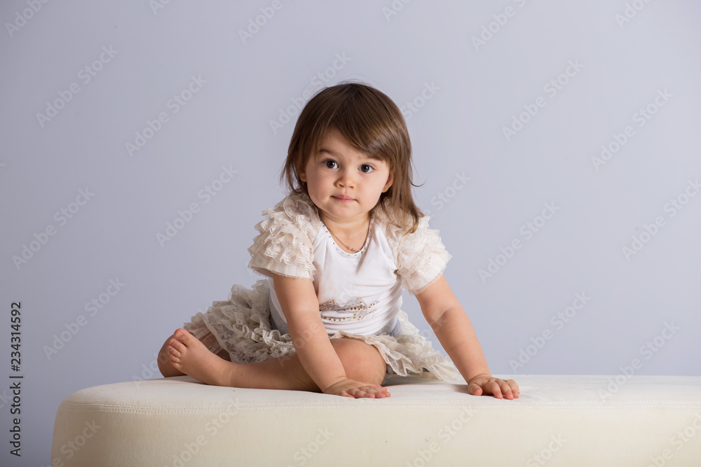 Pretty baby girl in white dress Pretty baby girl in white dress