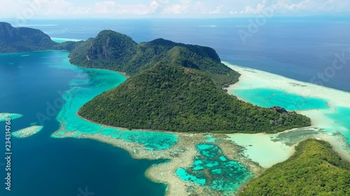 Aerial panoramic view of Pulau Bodgaya / Bohey Dulang Islands, turquoise crystal clear waters, beautiful lagoons and coral reefs of Celebes Sea - landscape panorama of Borneo, Malaysia, Pacific Ocean photo