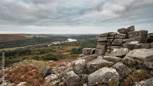 Stunning Autumn sunset landscape image of view from Leather Tor in Dartmoor National Park © veneratio