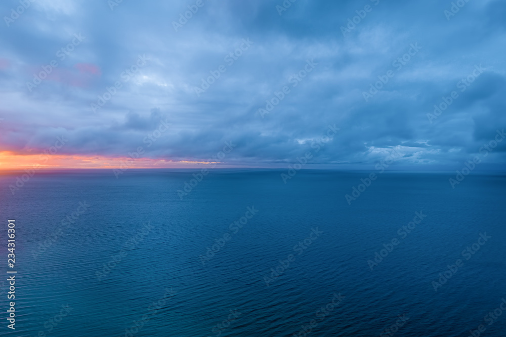 Aerial view of ocean at dusk