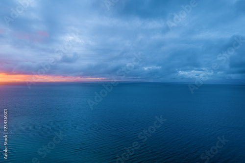 Aerial view of ocean at dusk