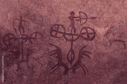 the image of an ancient hunter on the cave wall. ancient history, archaeology.