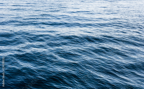Blue sea surface with waves . Water background.